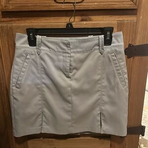 Ladies Izod Gold skort. Soft Grey. Size 2